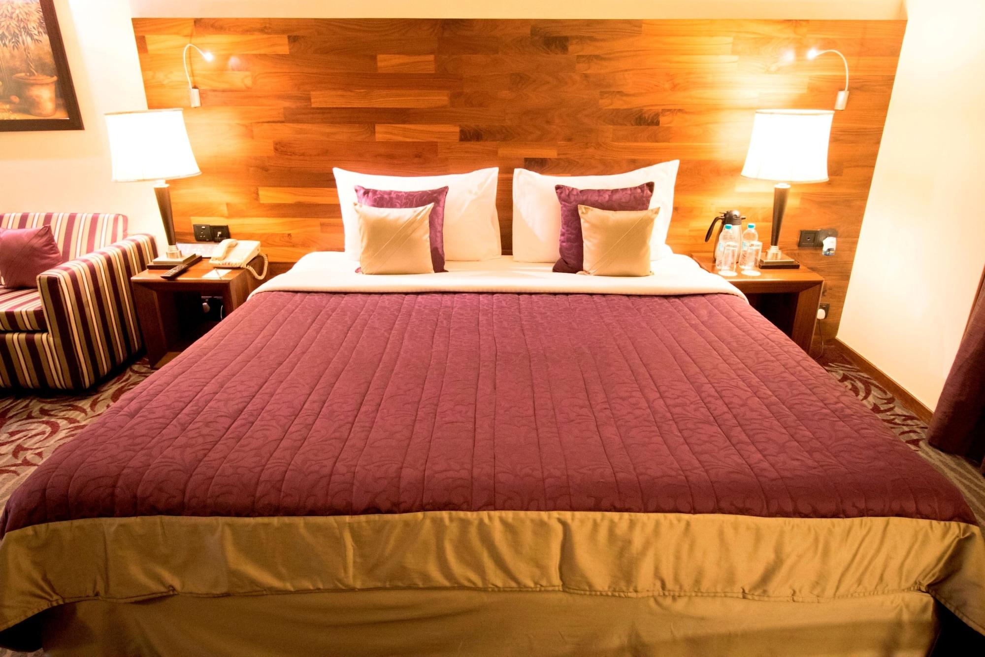 The Orchid Hotel Hinjewadi Púna Kültér fotó A bed